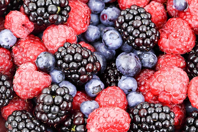 mixed berries seen fom above - raspberries, blackberries and blueberries